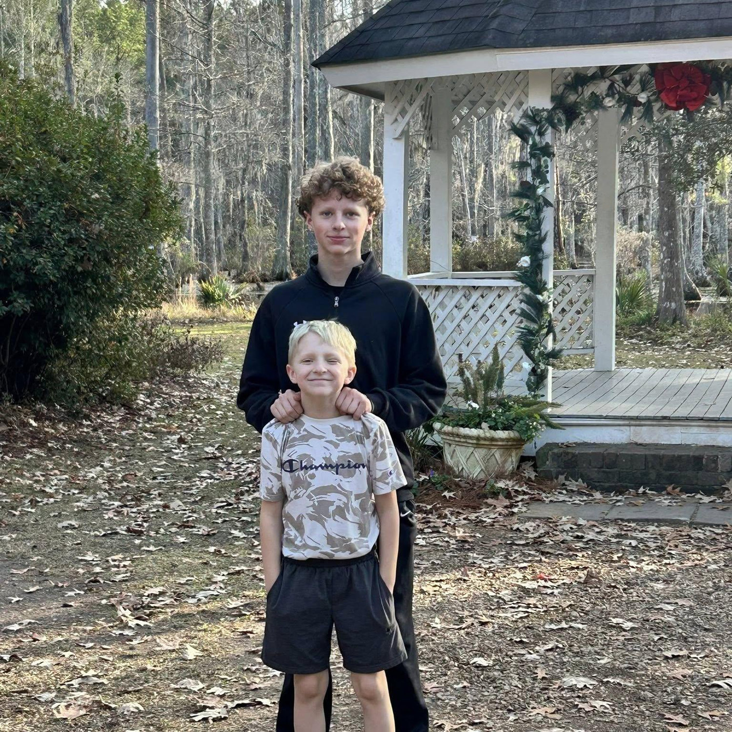 Lucas and Lee outside the Gazebo at cypress Gardens