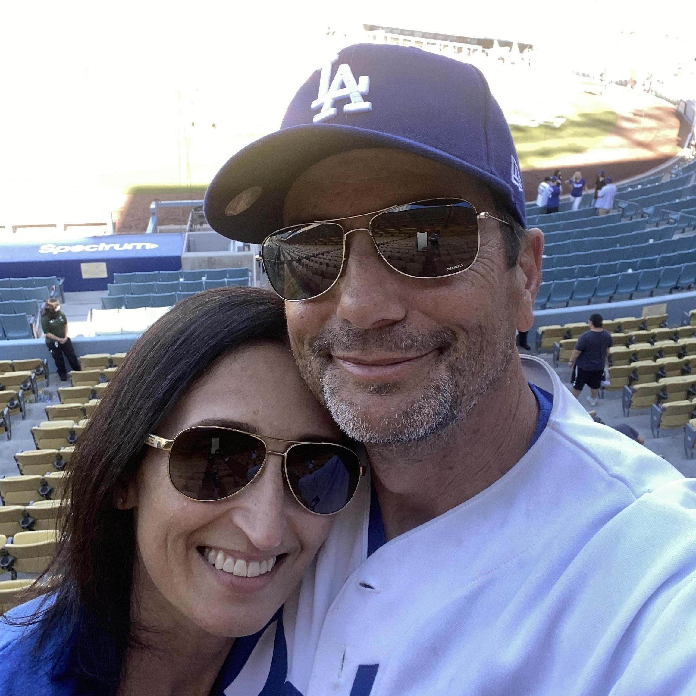 I'm an unapologetic, life-long, obsessive, die-hard Dodgers fan. She's not not-a-Dodgers-fan.
Close enough.