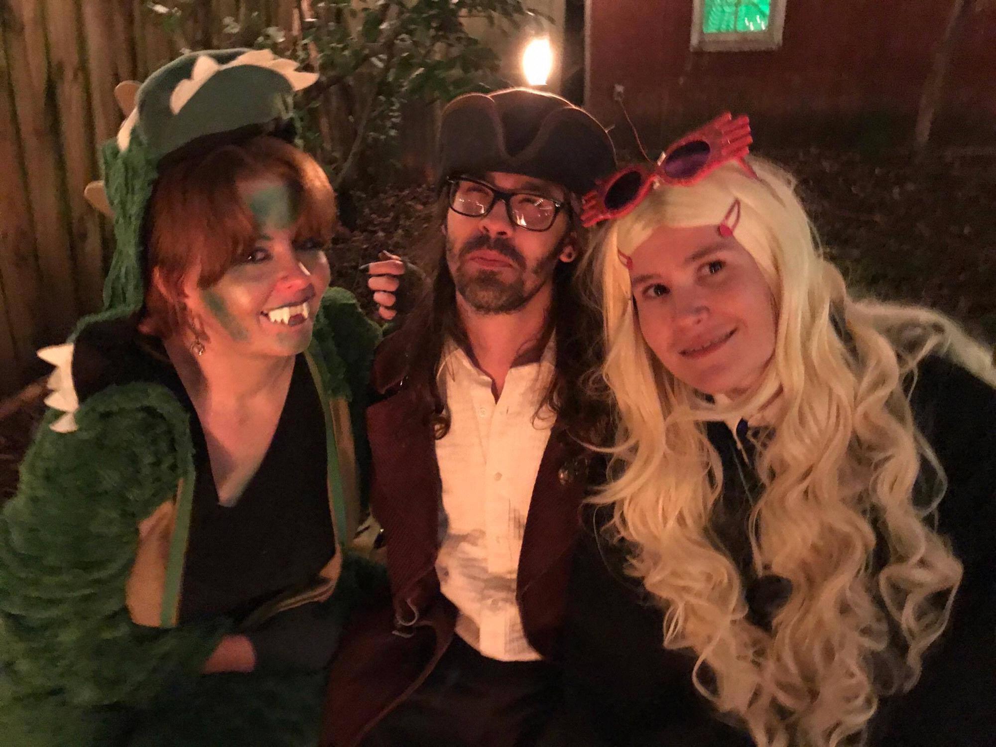 Timothy and his sister Beth as a pirate and Luna Lovegood, Halloween 2017. I am Godzilla.