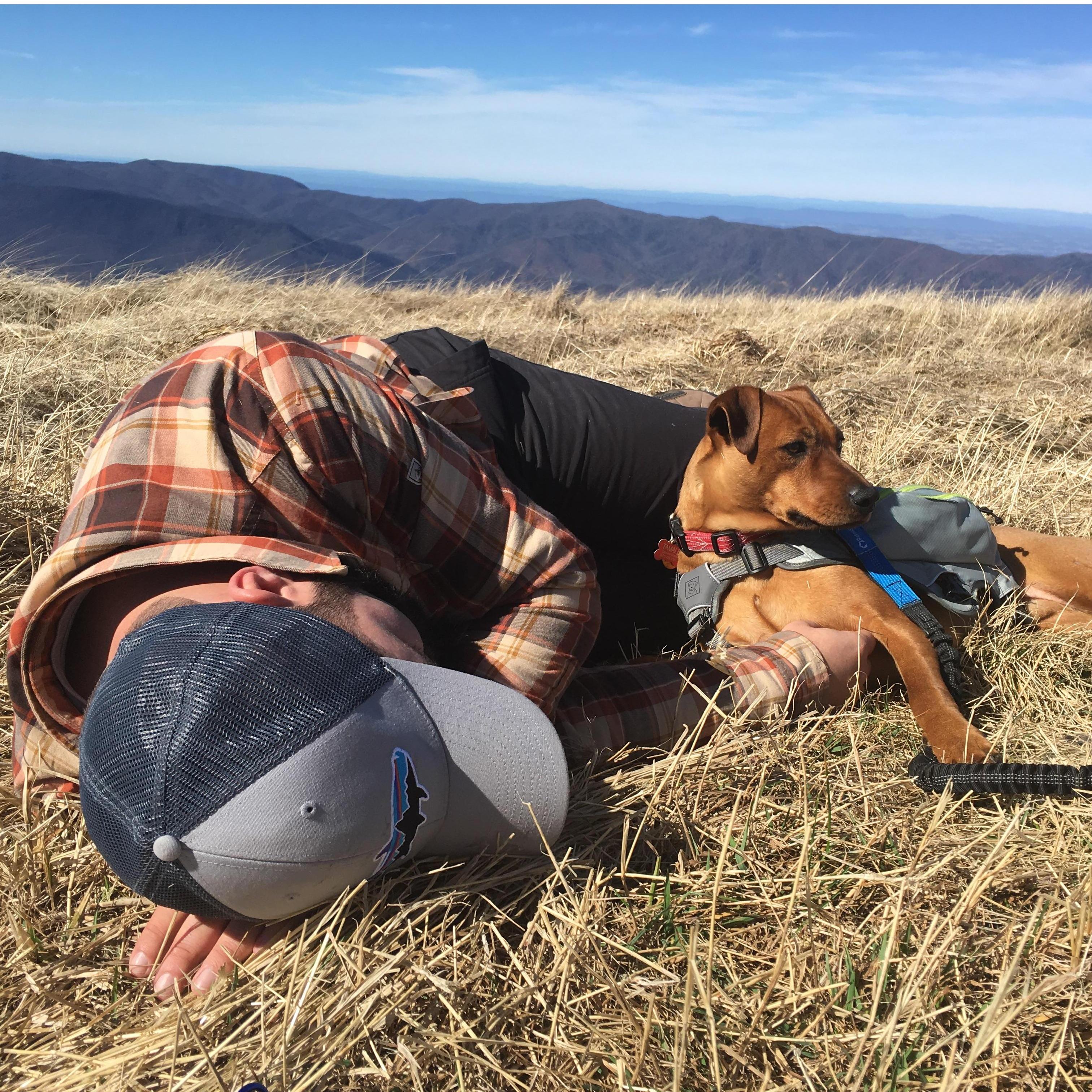 Feb. 2018. Big Bald Summit on the Appalachian Trail. Nathan found a new napping buddy in Tamale, especially on the top of long hikes.