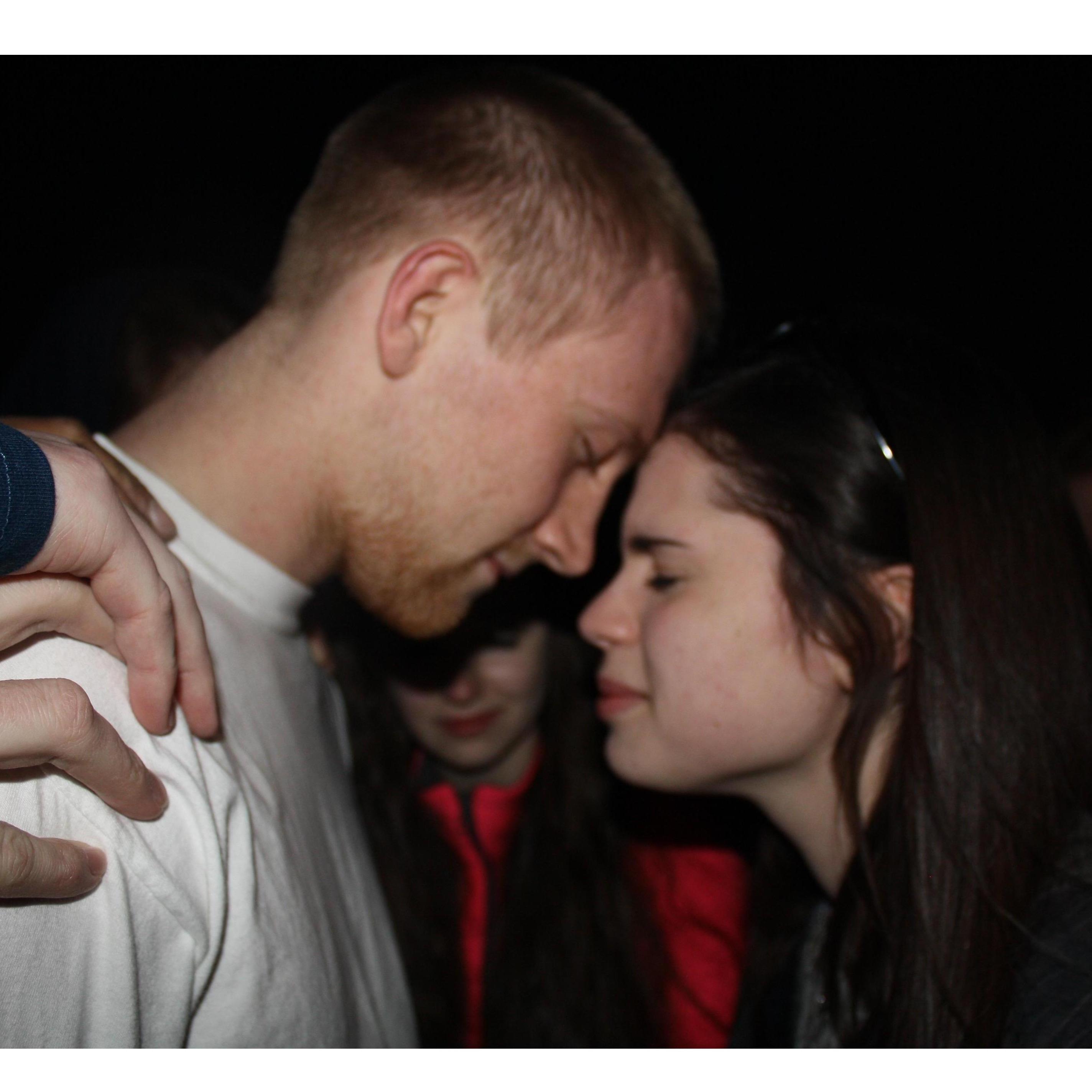 This sweet moment was caught after Jadon proposed. Our friends all gathered around us and prayed.