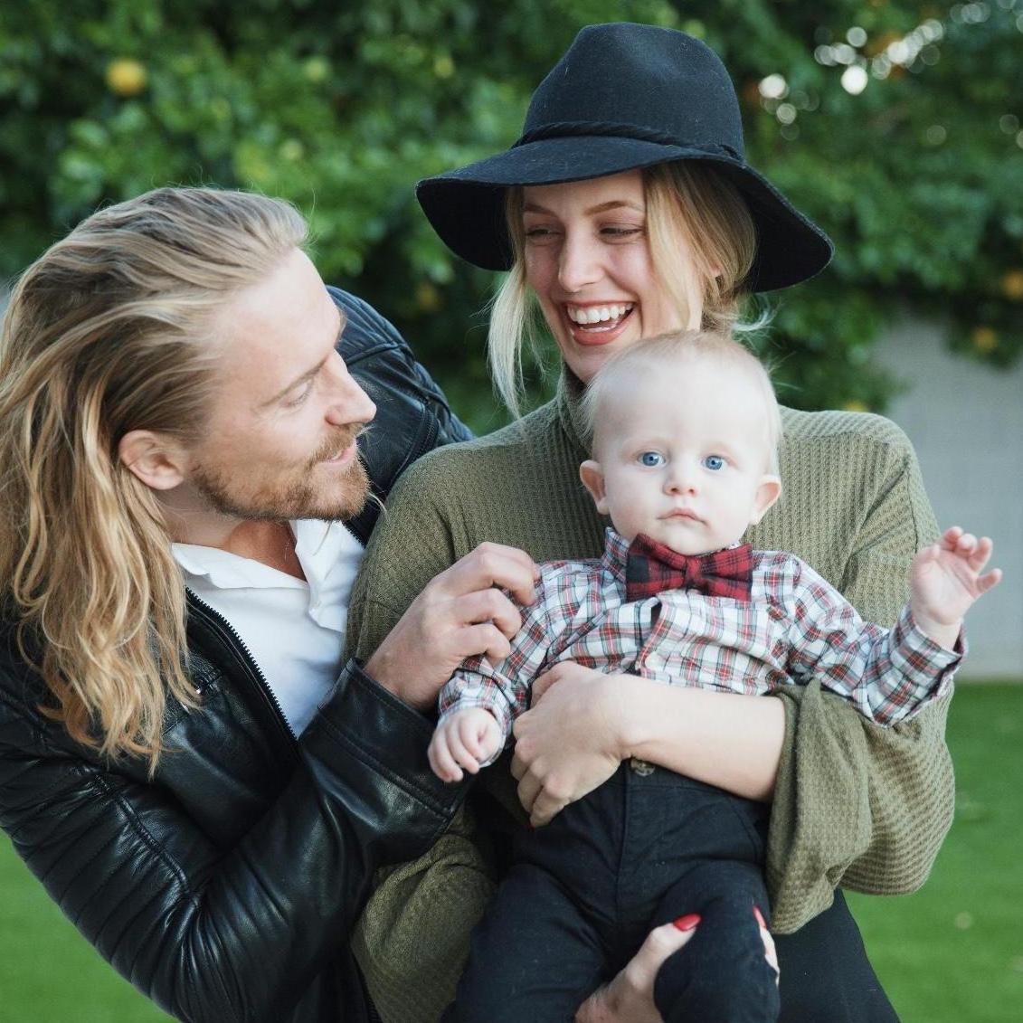 Max, Vanessa's sister's son, all dressed up for his first Thanksgiving and clearly enjoying Uncle Ter and Aunt Bon Bon.