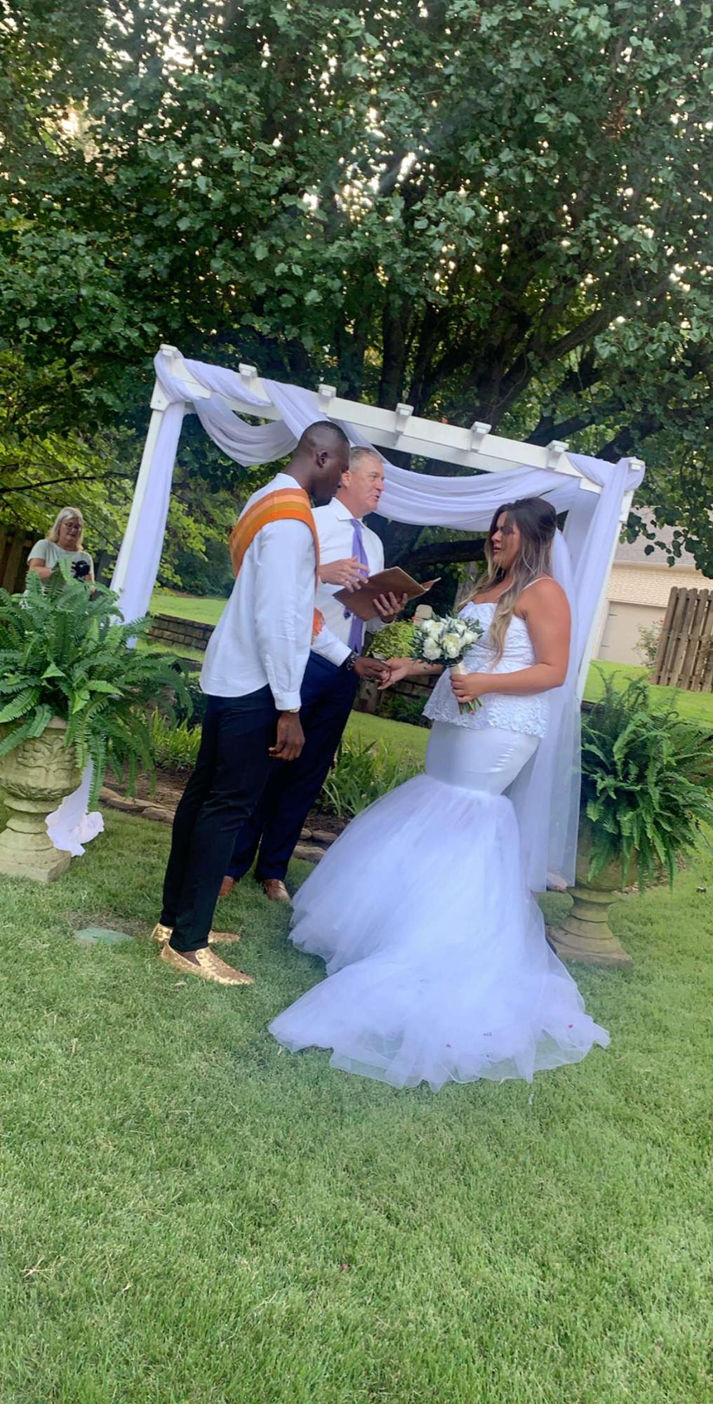 Caroline’s dad Married them on August 8th in Caroline’s Nanas backyard