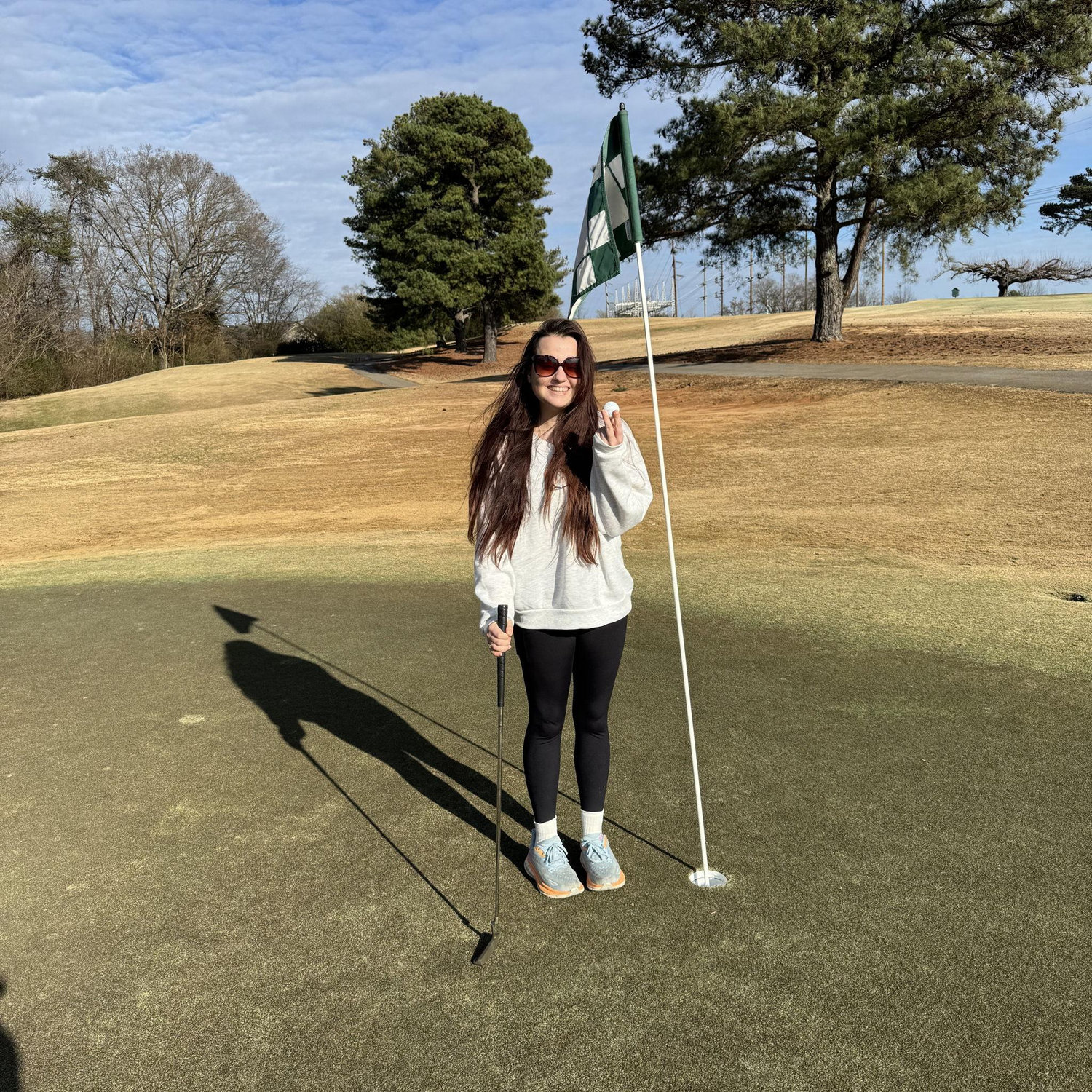Makenzie after making par on her first round of golf with Luke