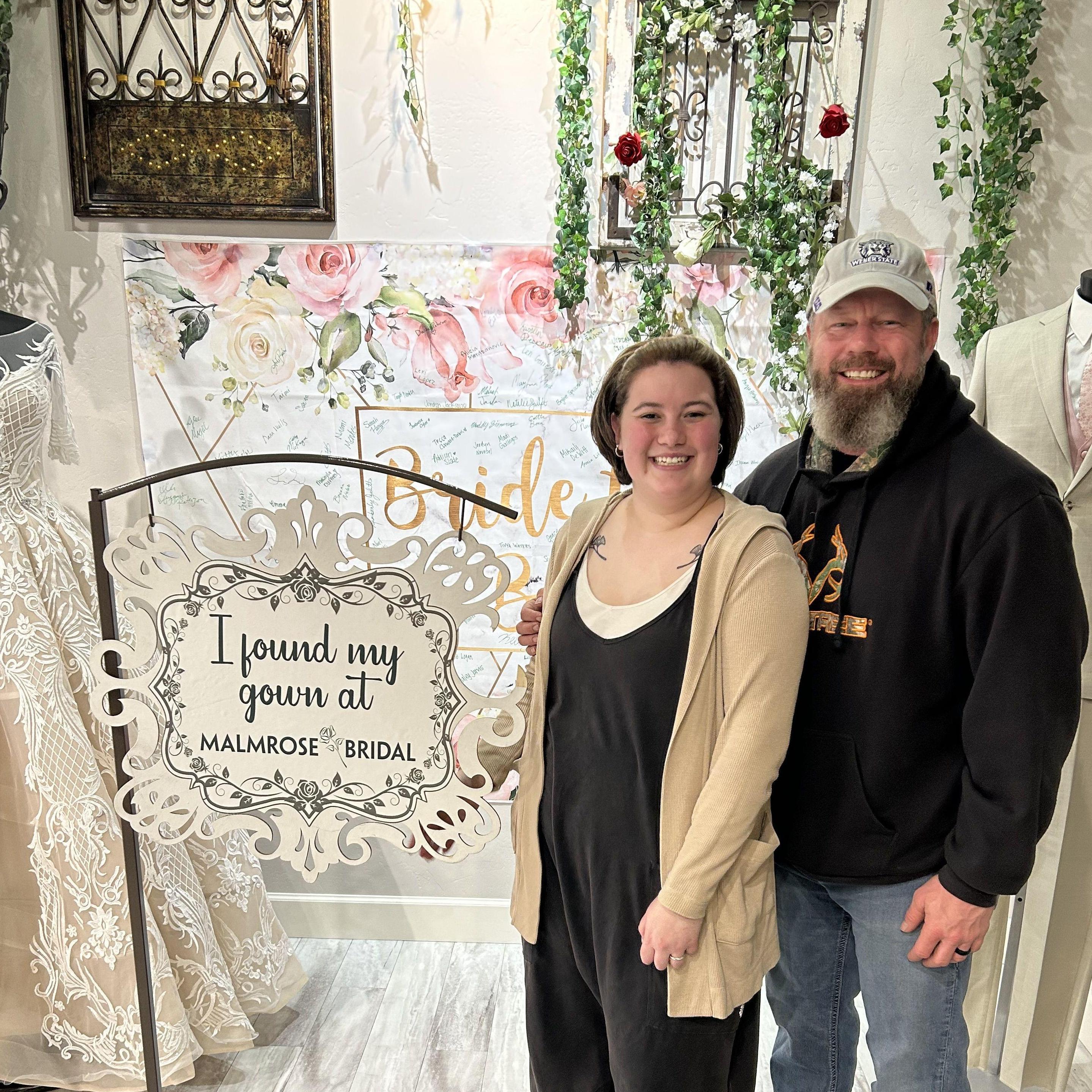 Savannah and her dad said yes to the dress at Malmrose!