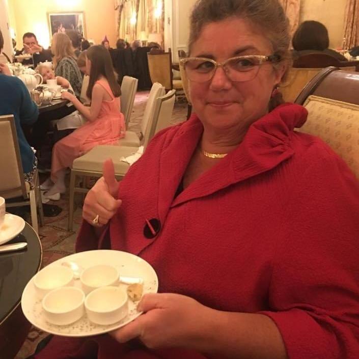 Mama loving her clotted cream during our family's favorite tradition: tea and the Nutcracker!