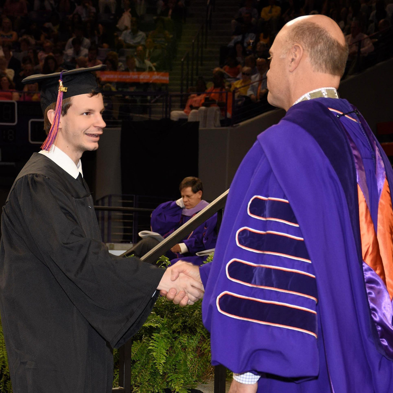 Andrew graduating from Clemson University in May 2017