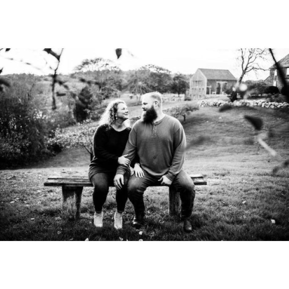 During our engagement shoot at Bourne Farm trying not to laugh at each other