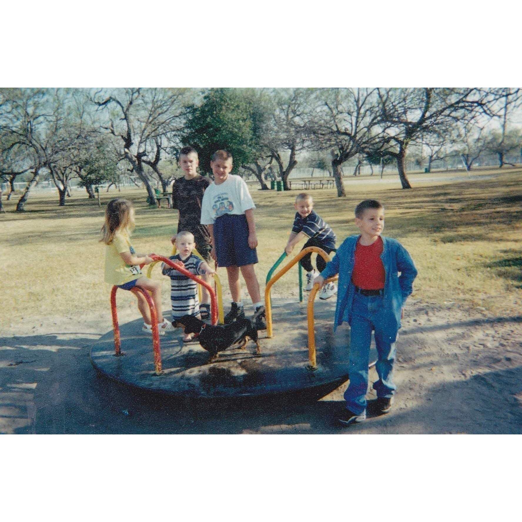 A baby picture of me. I am in yellow, not looking at the camera! Haha!