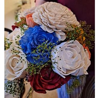 This is Lena's bouquet; we still need to fix the handle so that it looks pretty but otherwise, it's finished! Super easy to do, too!