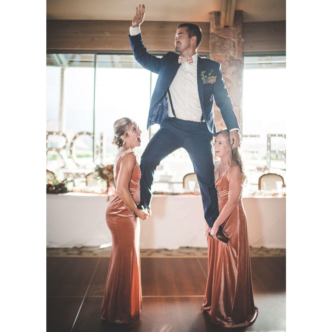 In 2021, Moira and Brad separately attended the wedding of Erich Drollinger and Molly Phillips as a bridesmaid and a groomsman. As fate had it, they were paired together, with Moira boosting Brad up like he was a cheerleader just like her at the wedding party entrances! Moira sat at the end of the table, and as such,  got to listen to Brad's endless terrible dad jokes as her only source of conversation.