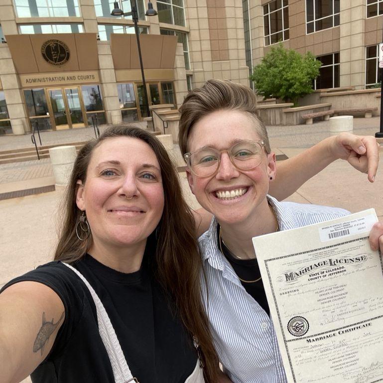 Our official wedding photo! With our marriage certificate in front of the Golden, CO courthouse