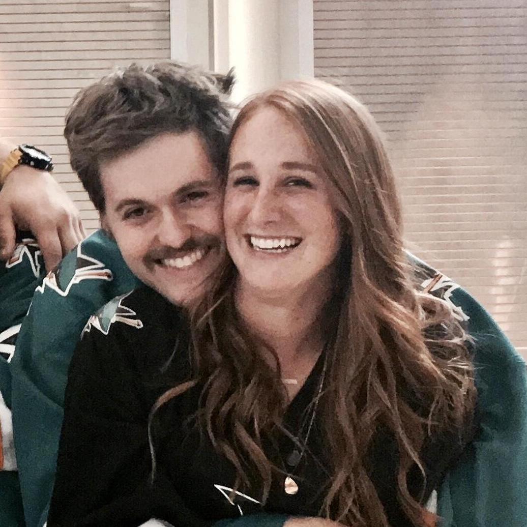 keeping each other warm at the Sharks Game
