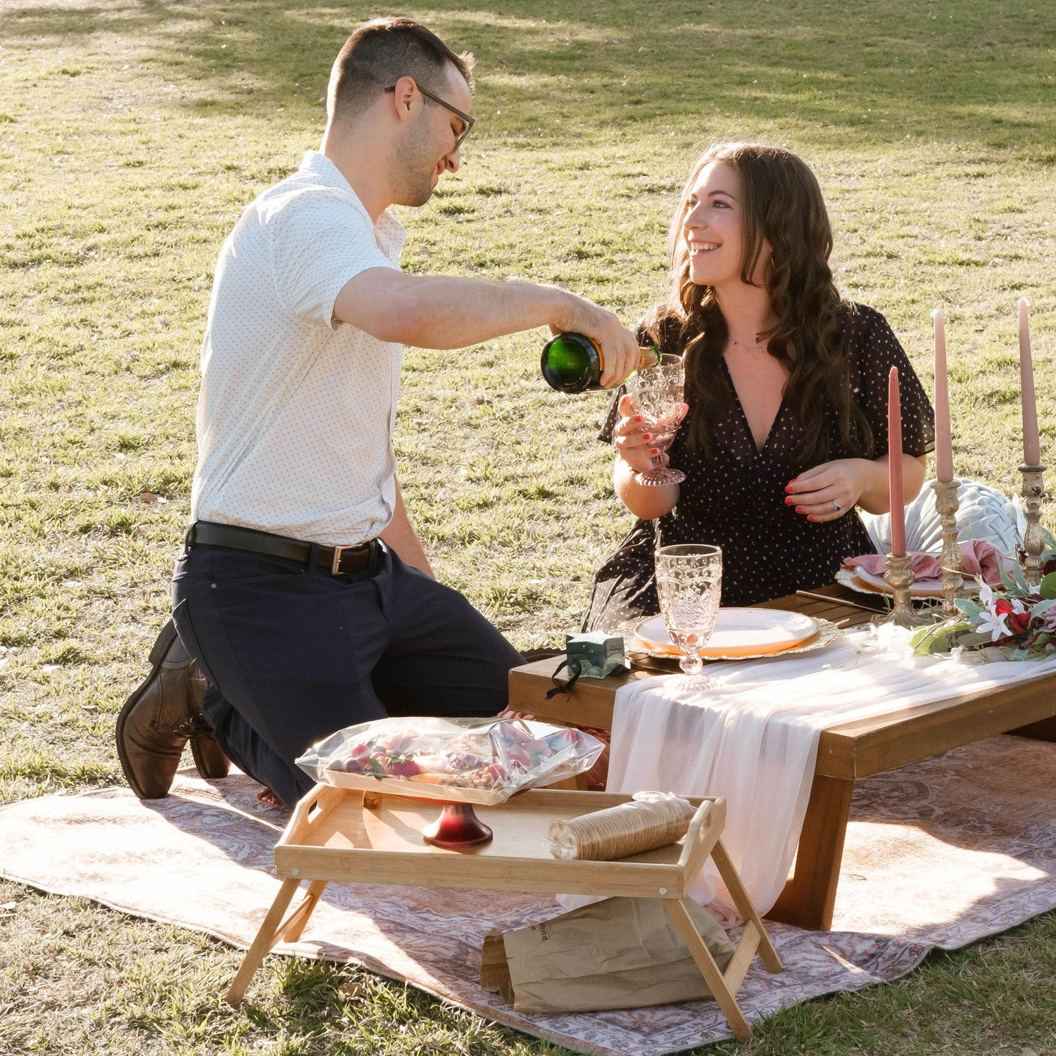 Jake's proposal in a park in Austin, TX in April of 2022