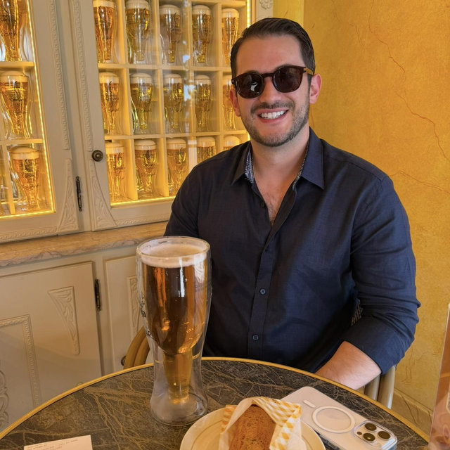 Helping Andrés stay hydrated one giant beer at a time.
