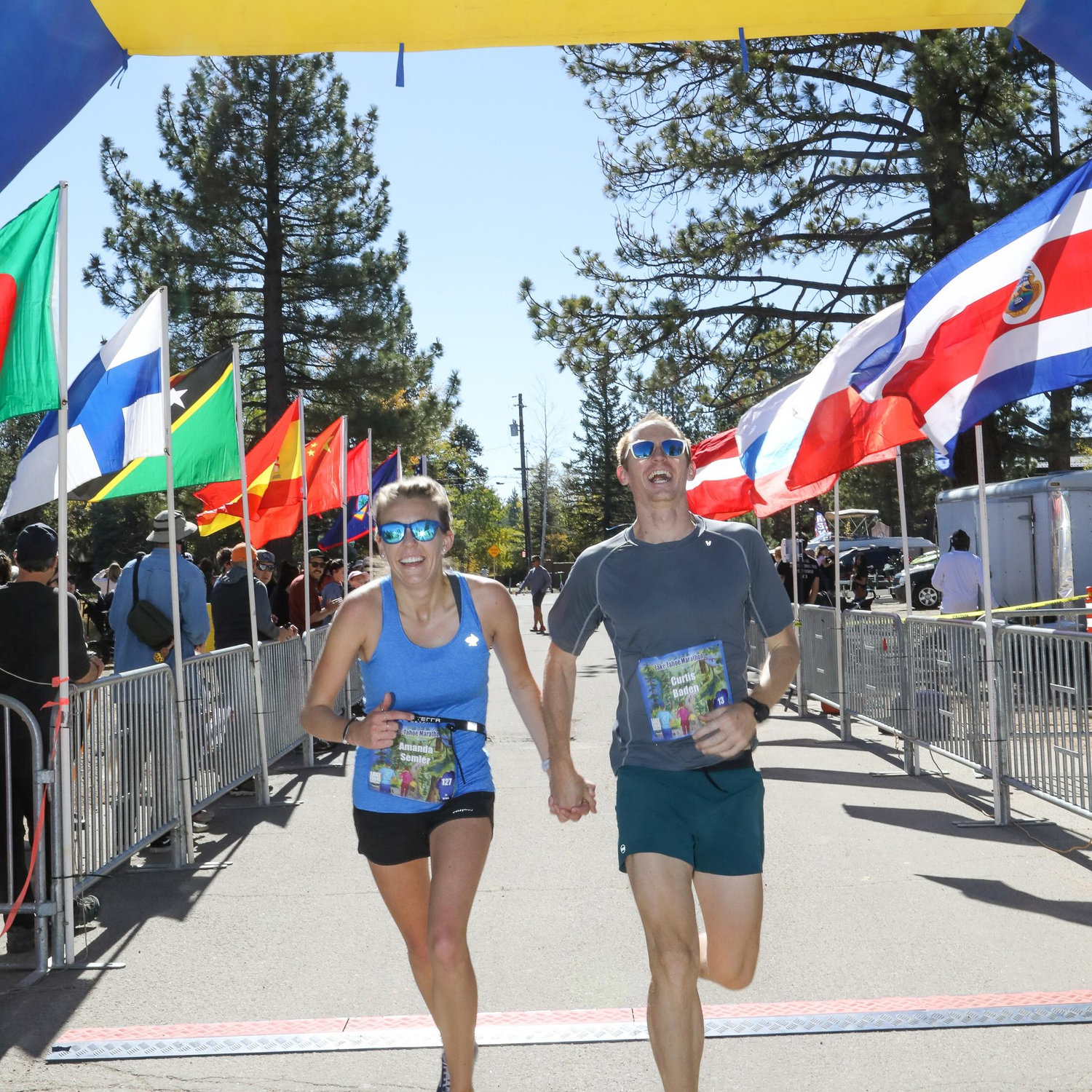 Crossing the finish line of the Lake Tahoe Marathon! (Curtis could've gone much faster, but we raced – and suffered – together.)