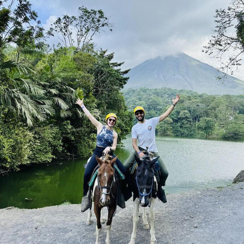 Horseback riding in Costa Rica– going up the side of that volcano in the background!