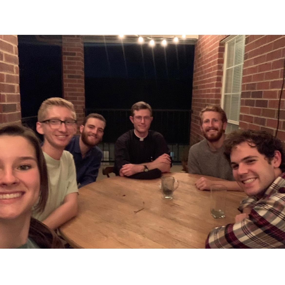 First photo of Mary and Sean, back when they were friends and enjoyed “Pipes, Pints, and Mosquito Bites” with their friends and priest