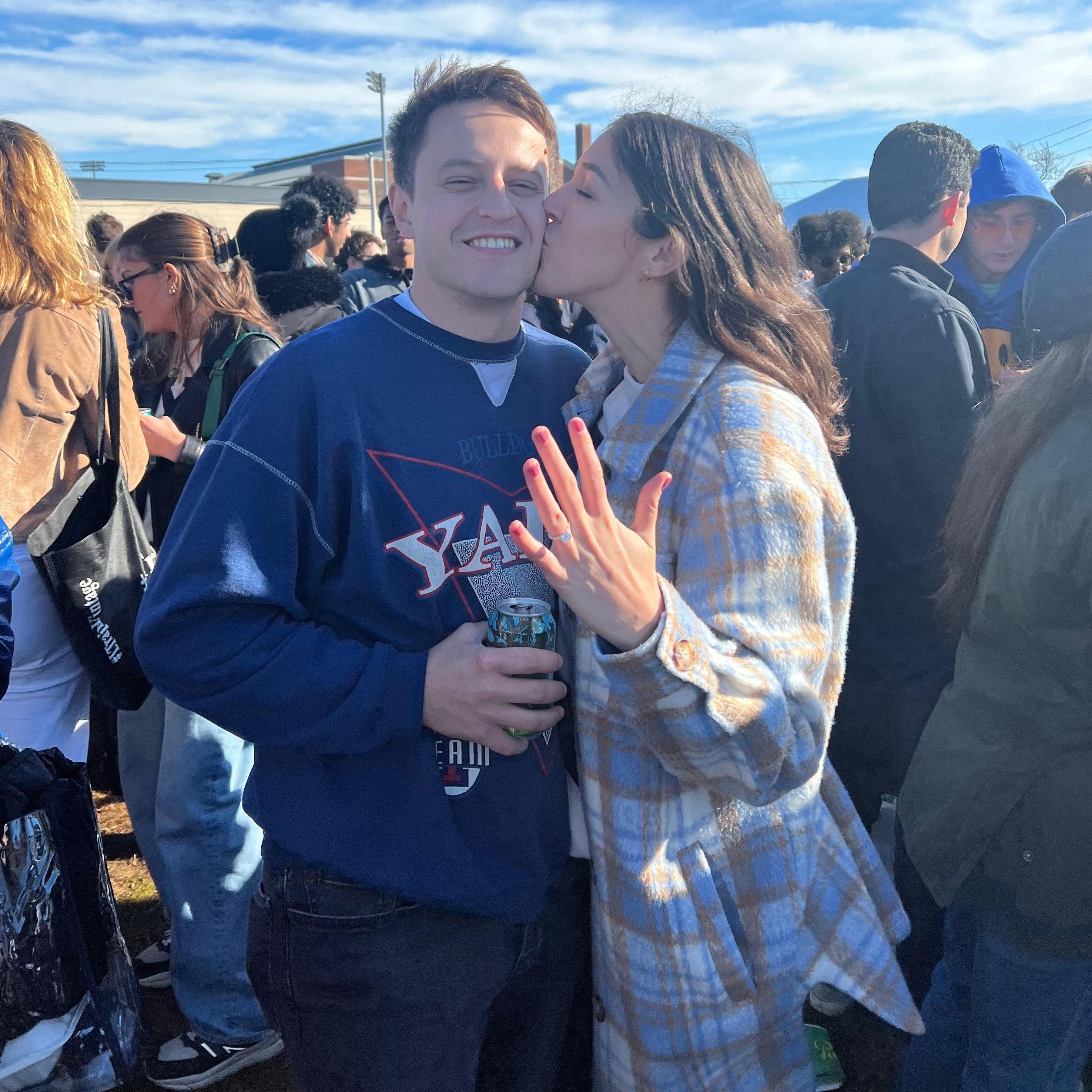 This photo was taken at the Harvard-Yale alumni tailgate. Annalise was impressed that sooooo many people came out to celebrate her engagement.