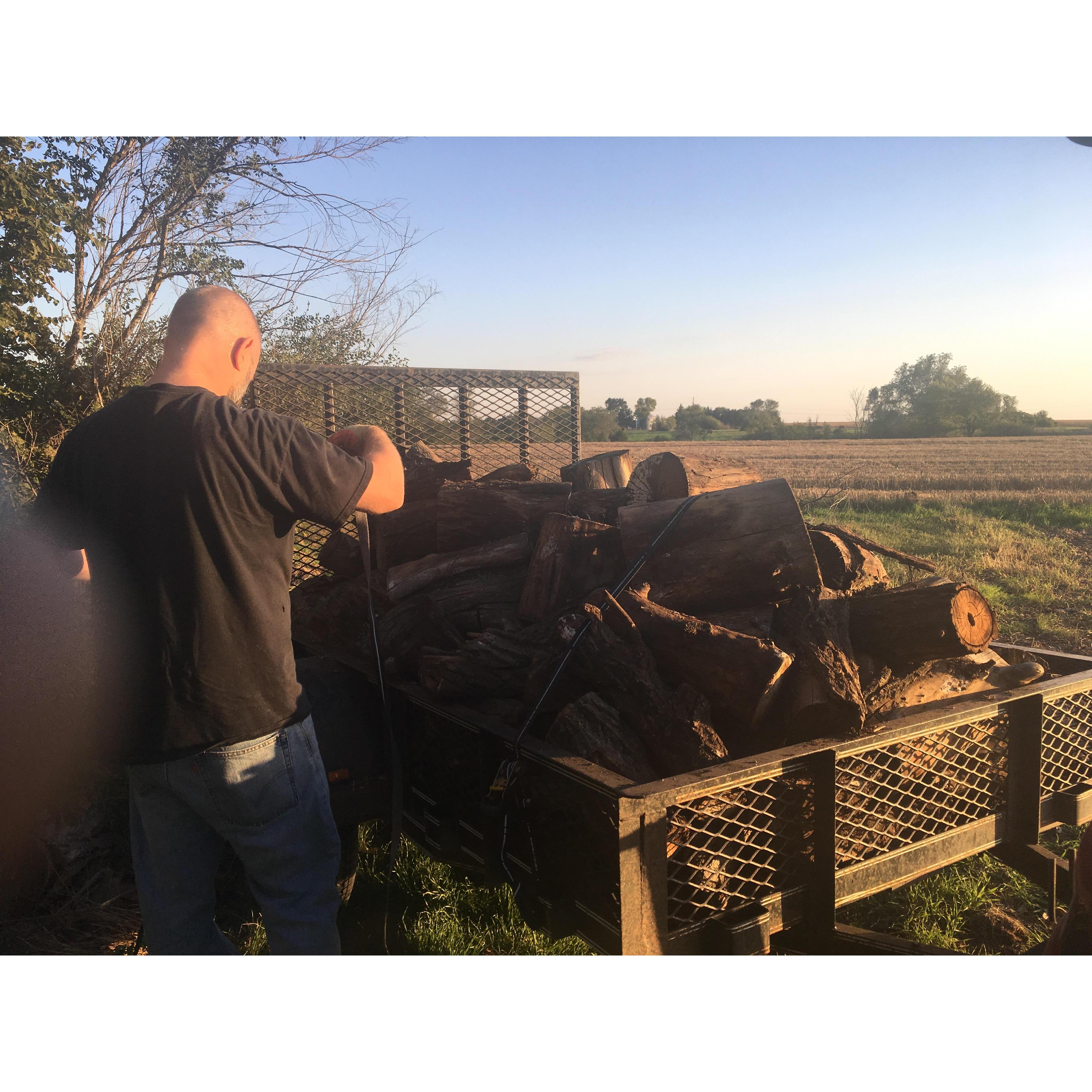 Shawn and Christine chop wood every year for the Einsel Compound