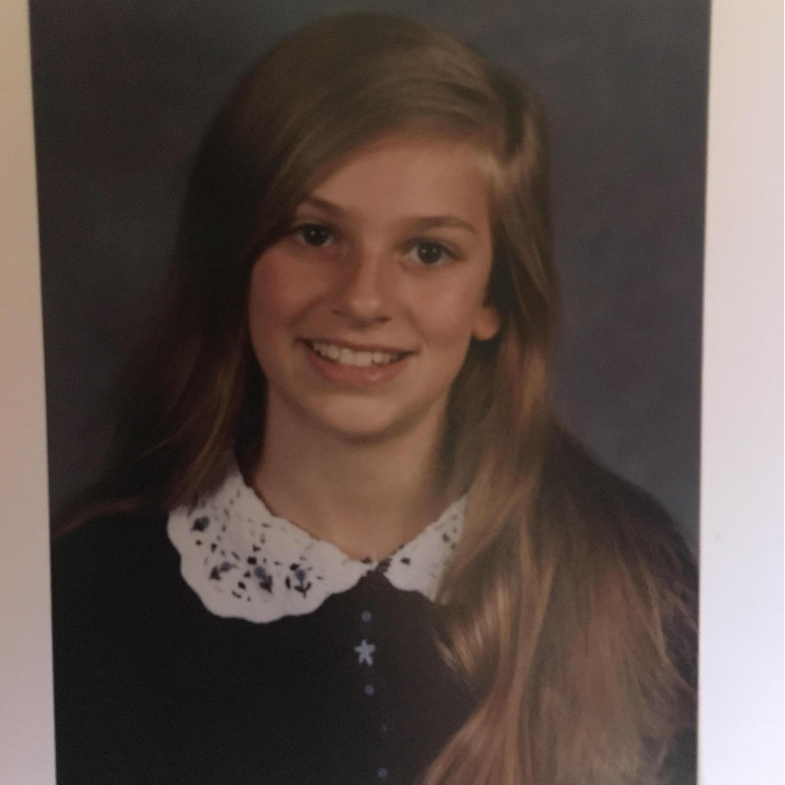 Elizabeth: In her teens. She had quite a volume of hair.