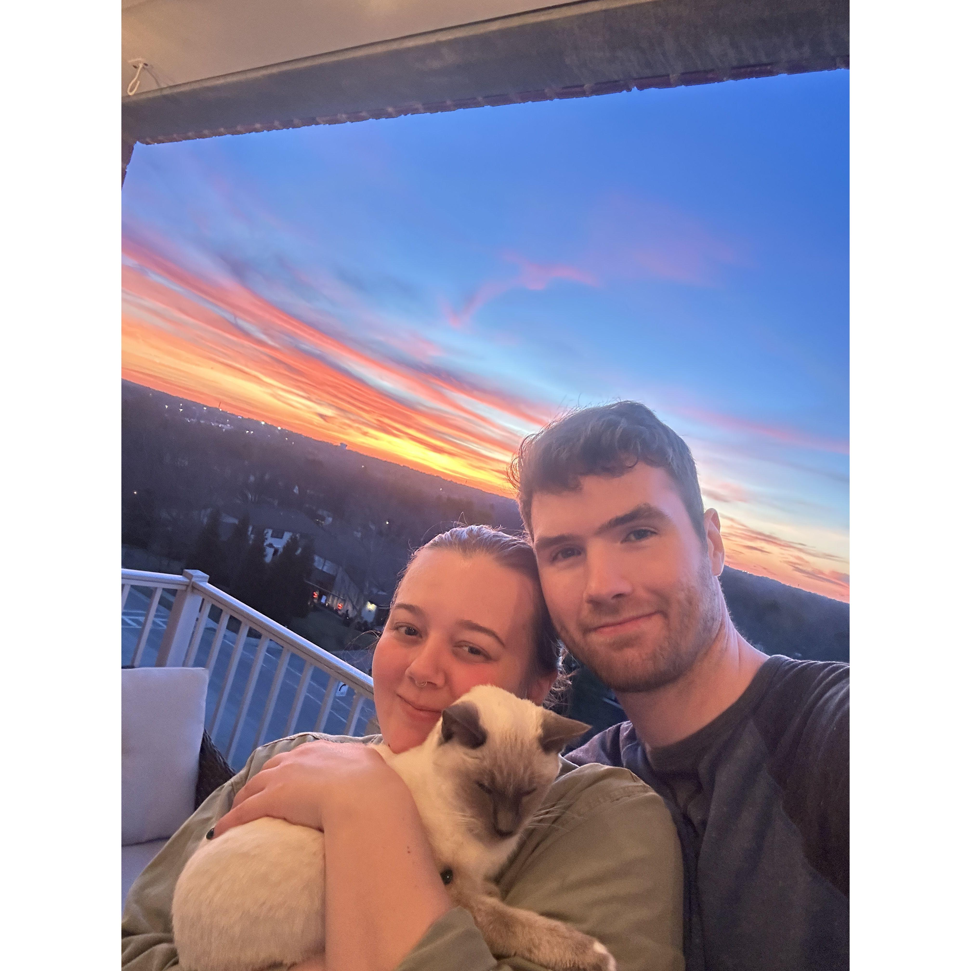 Moshi enjoying her last sunset with her doting parents.