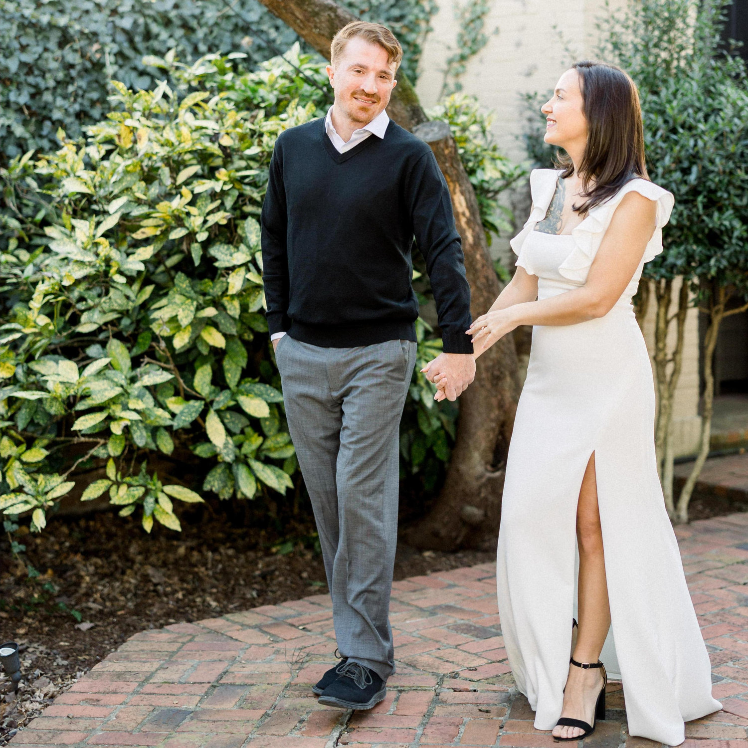 Mary admired Jonathan during their engagement photo shoot. She loves him!