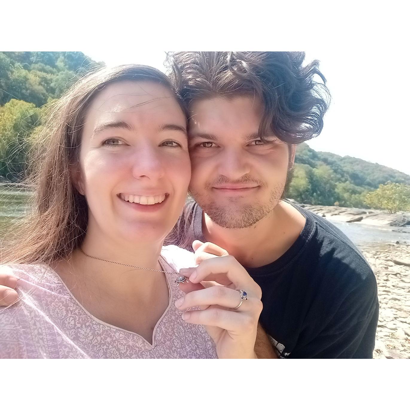 This picture is after Jacob proposed by the river in Harper's Ferry, WV. We're both wearing the same outfits we wore on our first date.