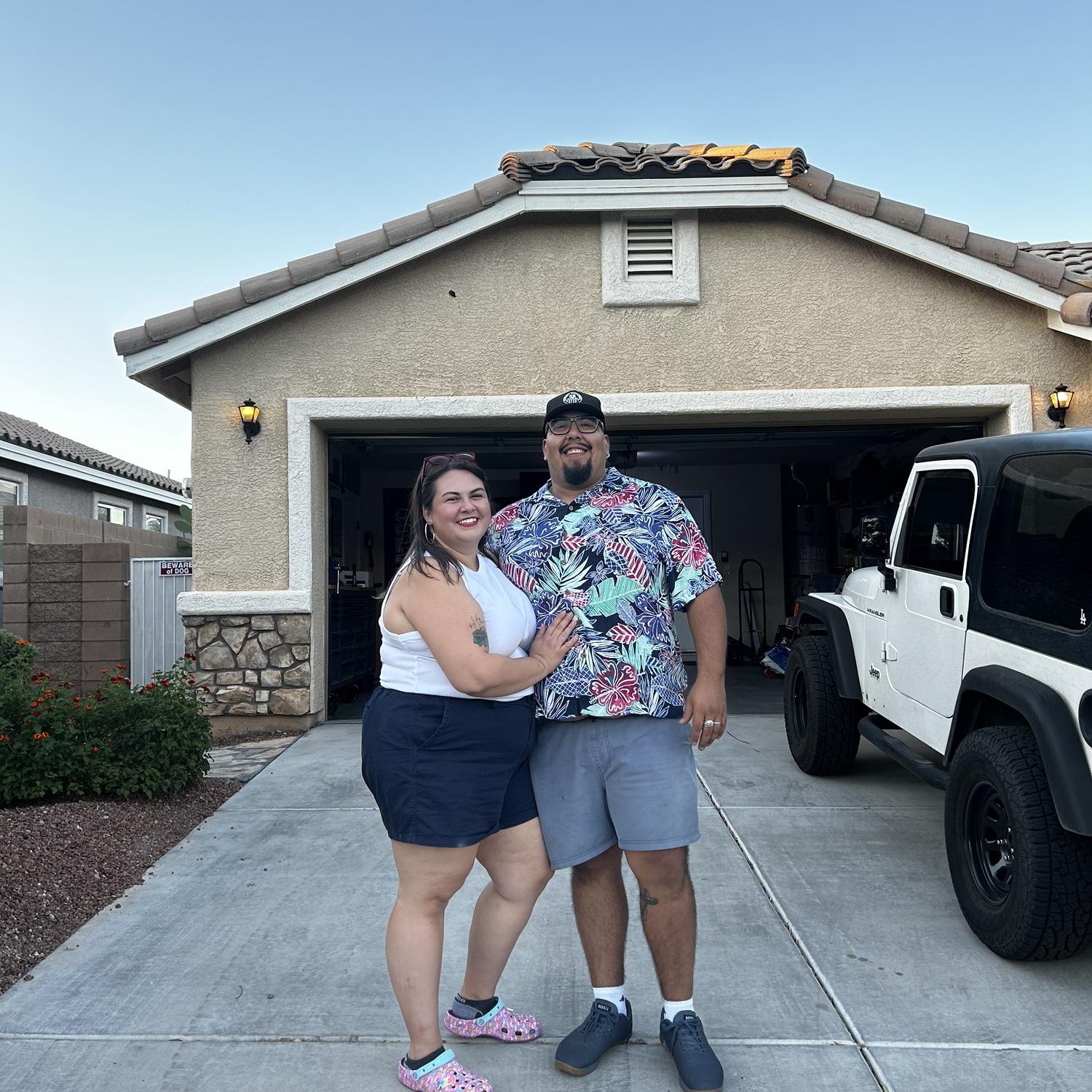 Us about to host our housewarming party to celebrate the new house.