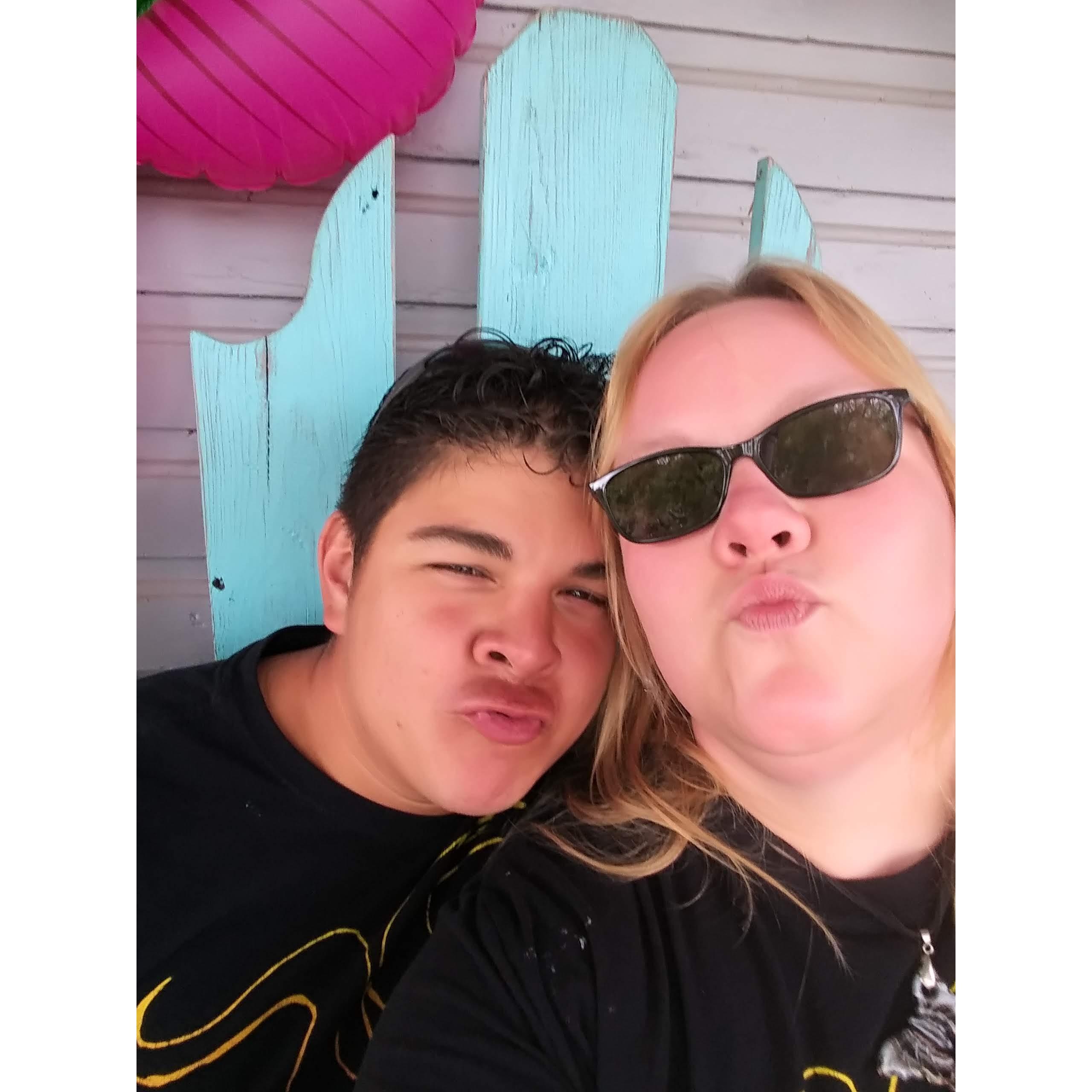 Terri and Jubal outside a souvenir shop trying to look cool.