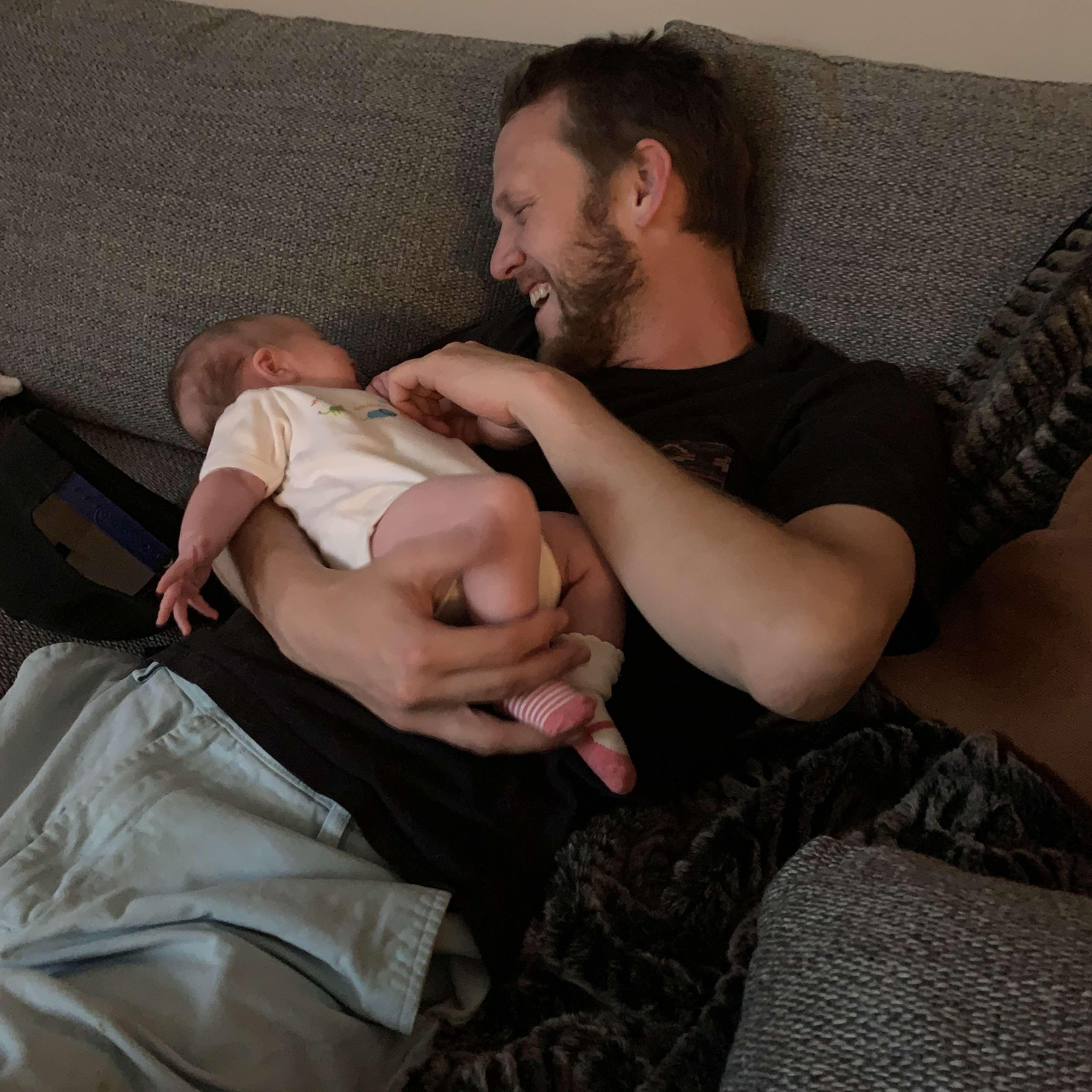 Evan says he's afraid of holding babies, but Anna thinks he's a natural! (Evan and Rowan, 2022)