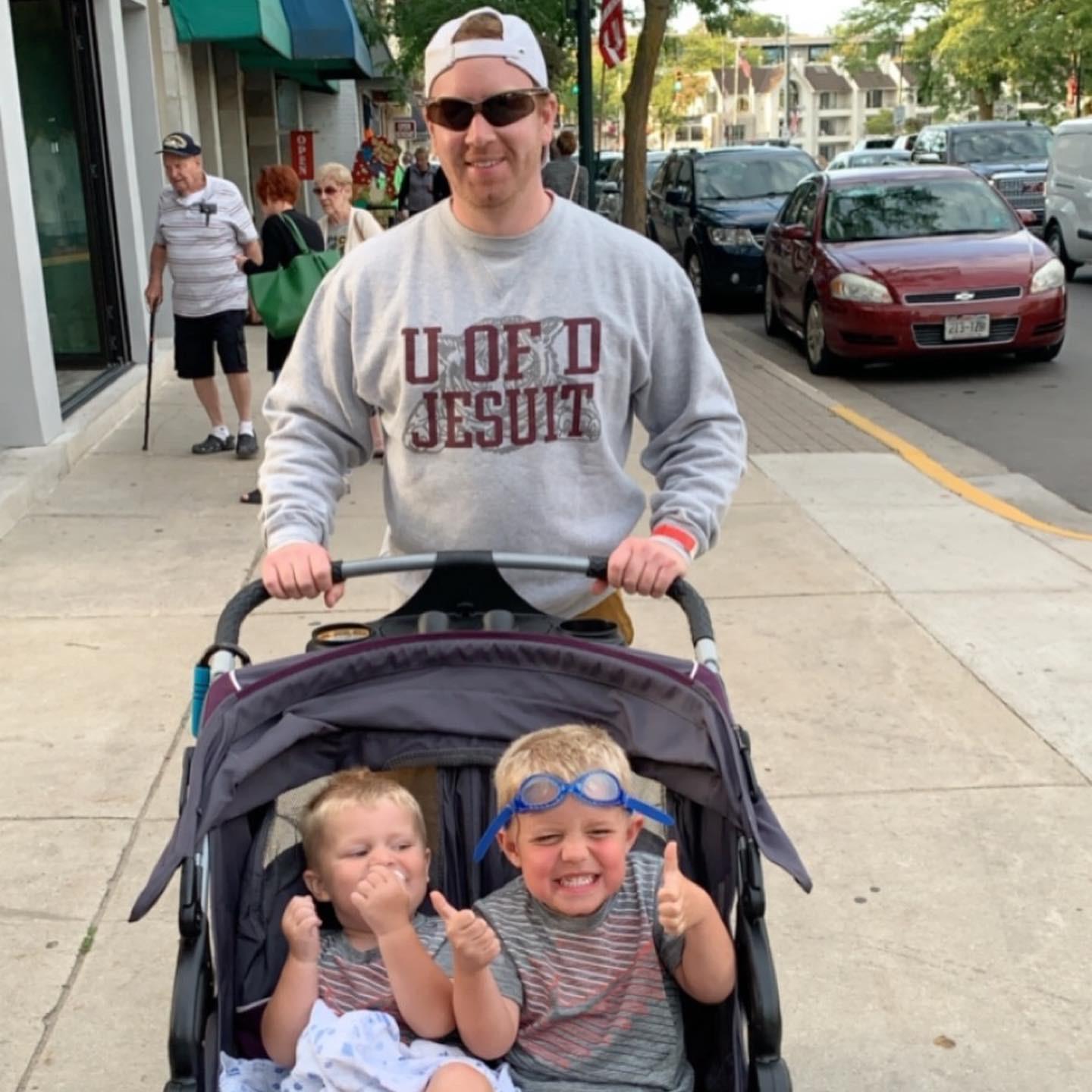 Brendan, Jake, and Dylan up north in Charlevoix. Brendan learning how strollers work.