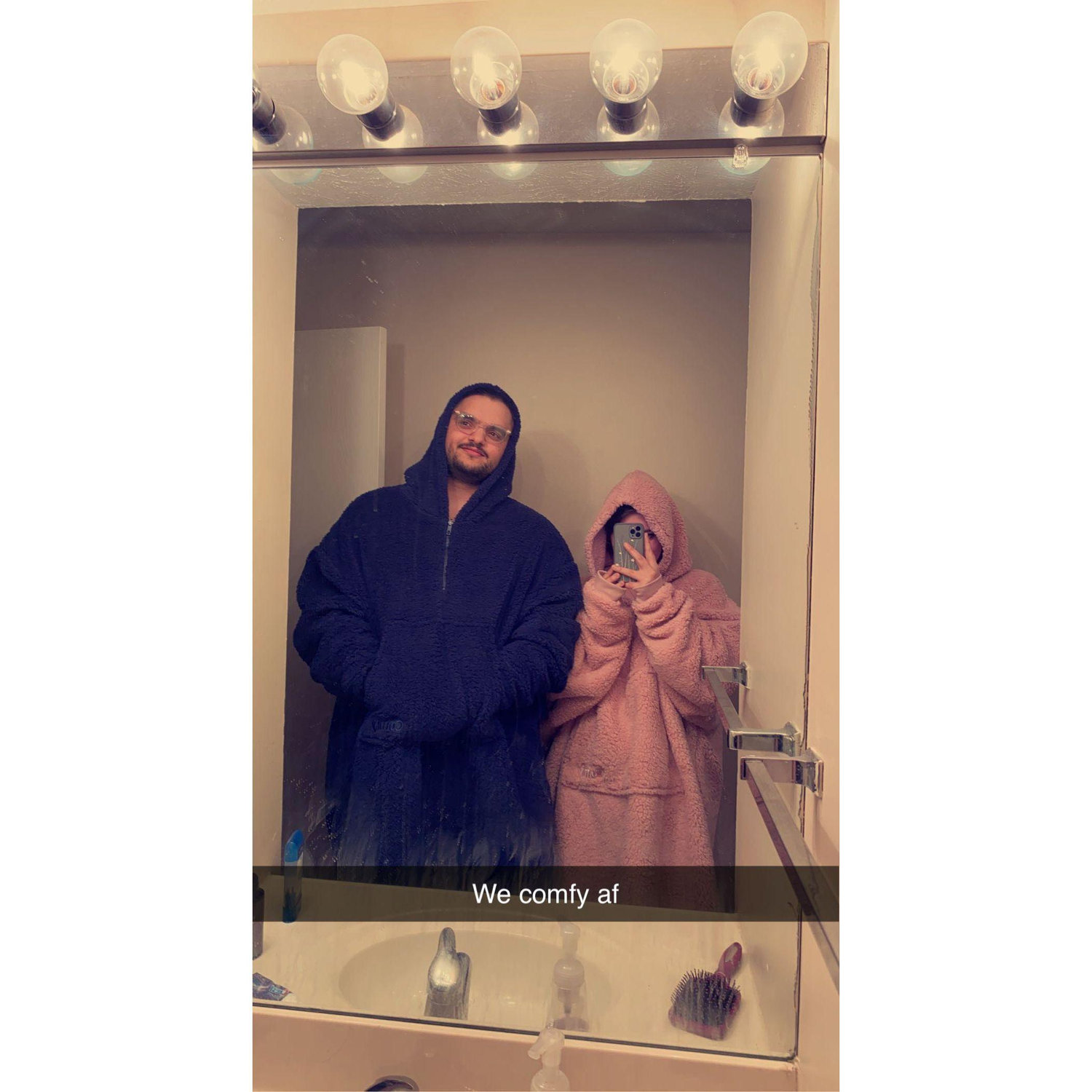 He got us matching Snuggies.