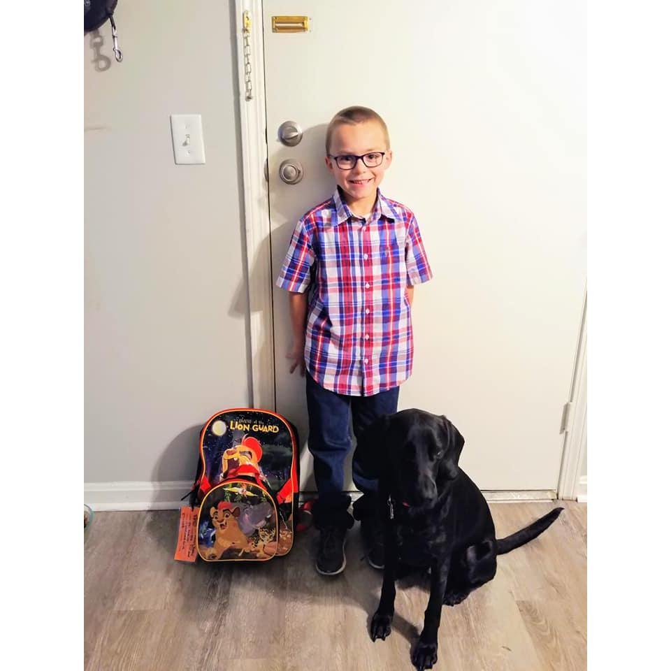 Robby's first day of 2nd grade at our first apartment all together