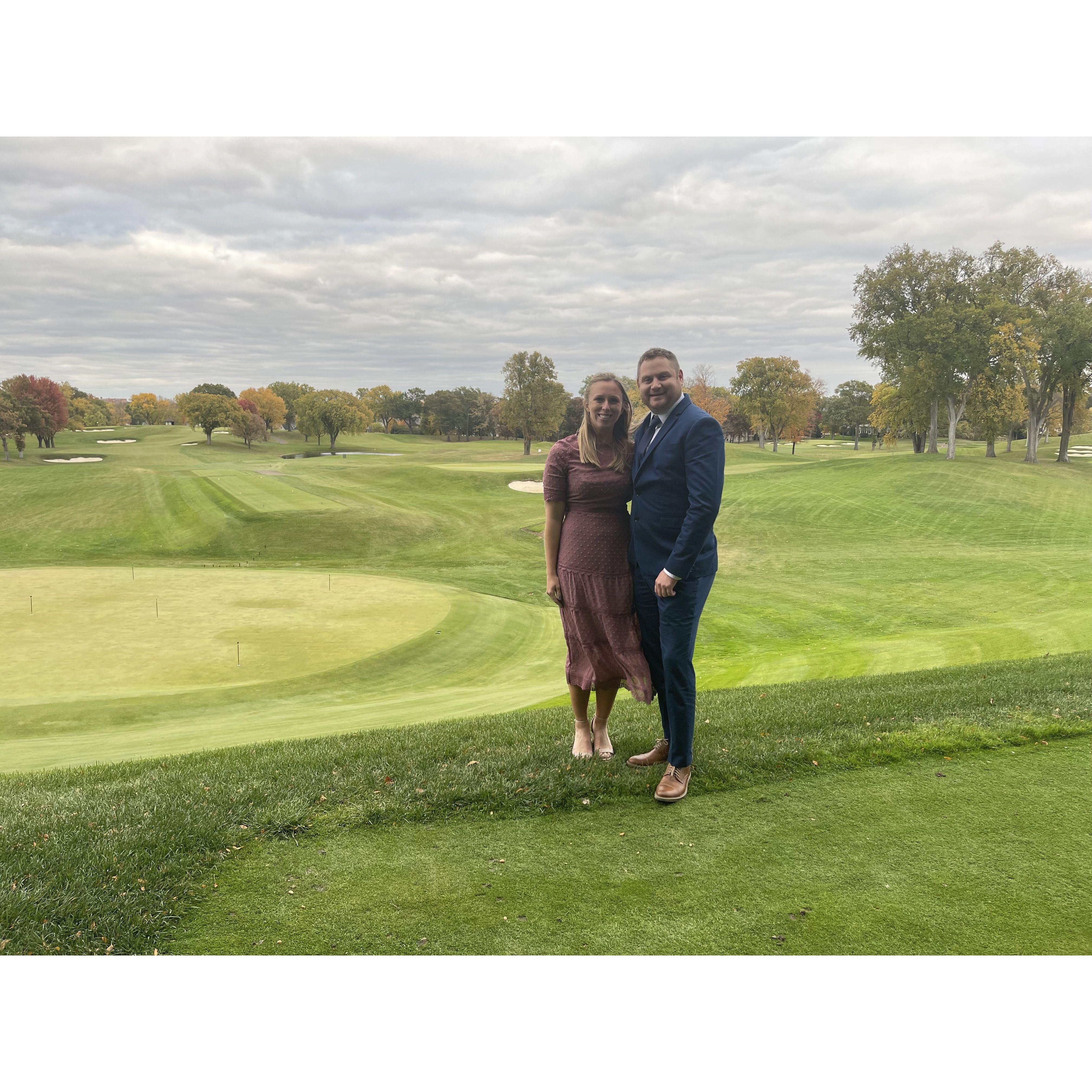 A rare photo of us not in golf attire (but still at a golf course).