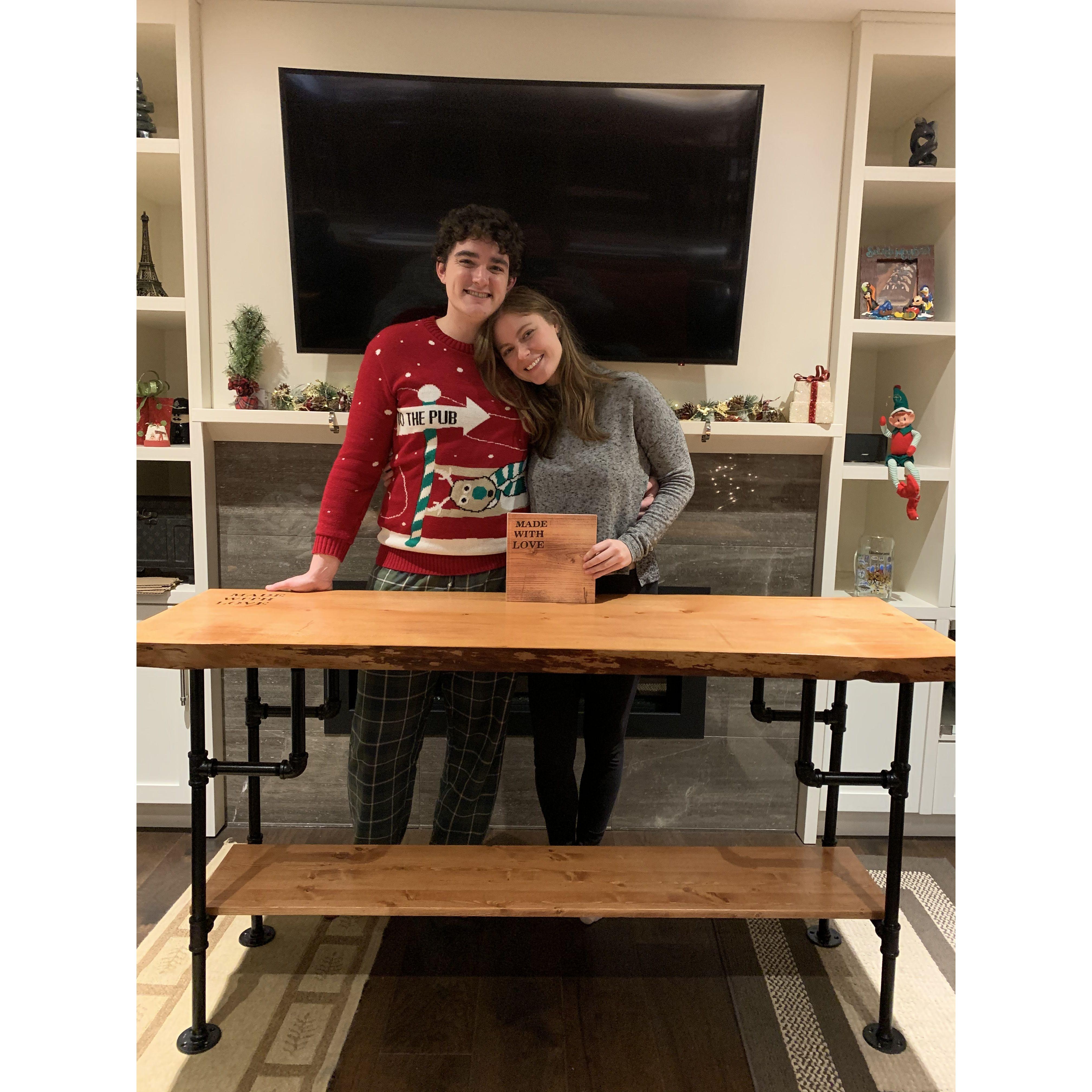 Our first Christmas together. Ben built Hannah this table and engraved it with the words "made with love".
