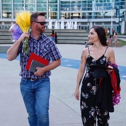 Always the gentleman, Anthony carrying the load as we leave my college graduation in Anaheim,.