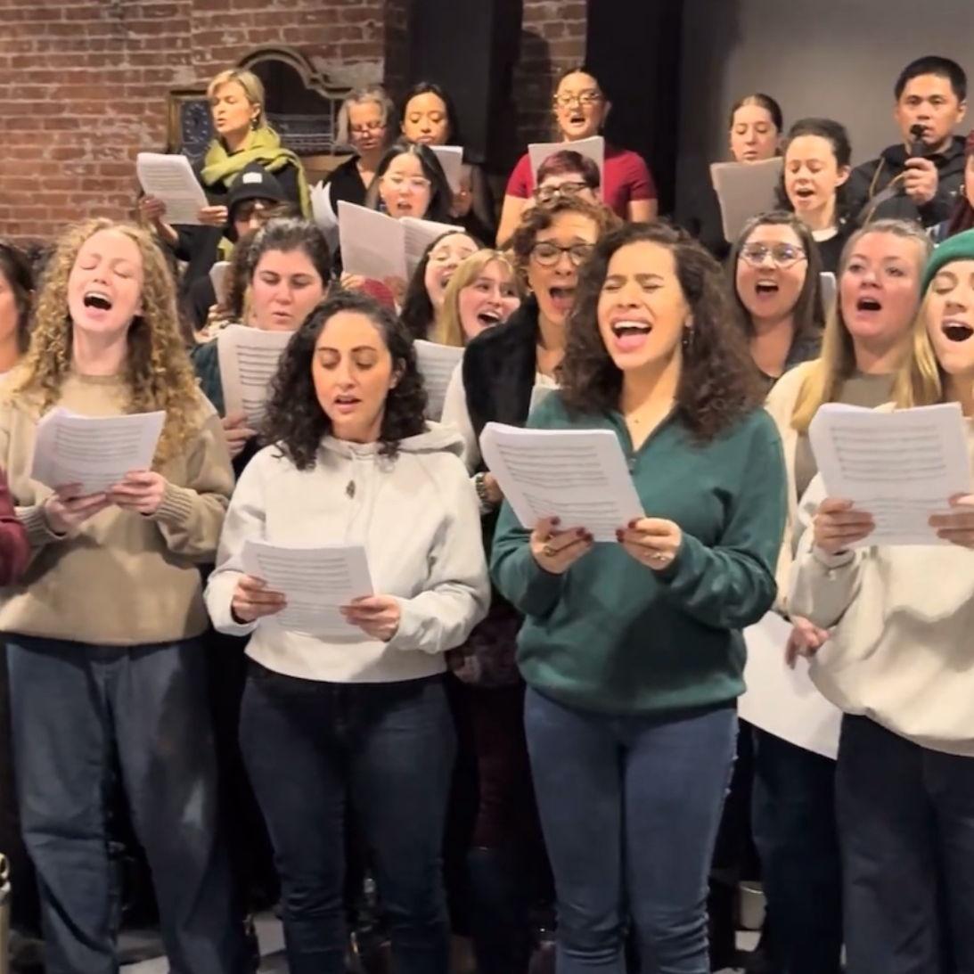 Singing "Defying Gravity" in a Brooklyn warehouse with hundreds of random strangers, long before we knew we would be getting married at Oz Farm