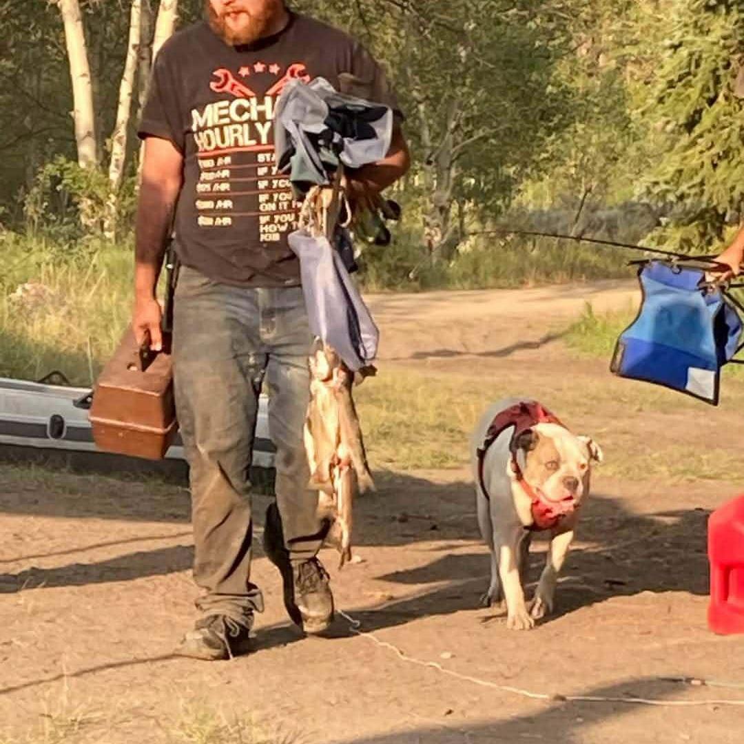 The fisherman Lance ready to enjoy some true fresh caught fish with his little buddy.