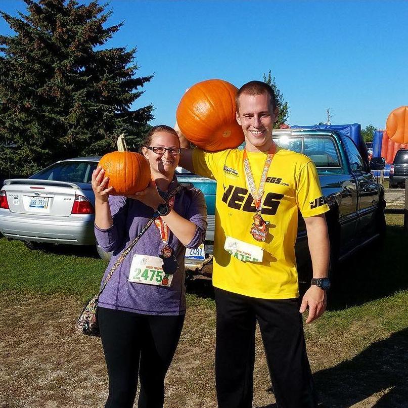 The Great Pumpkin Run. Yes, we ran a full 5k while carrying those pumpkins! Pretty sure Zach chose the biggest one out of all the runners at the event.