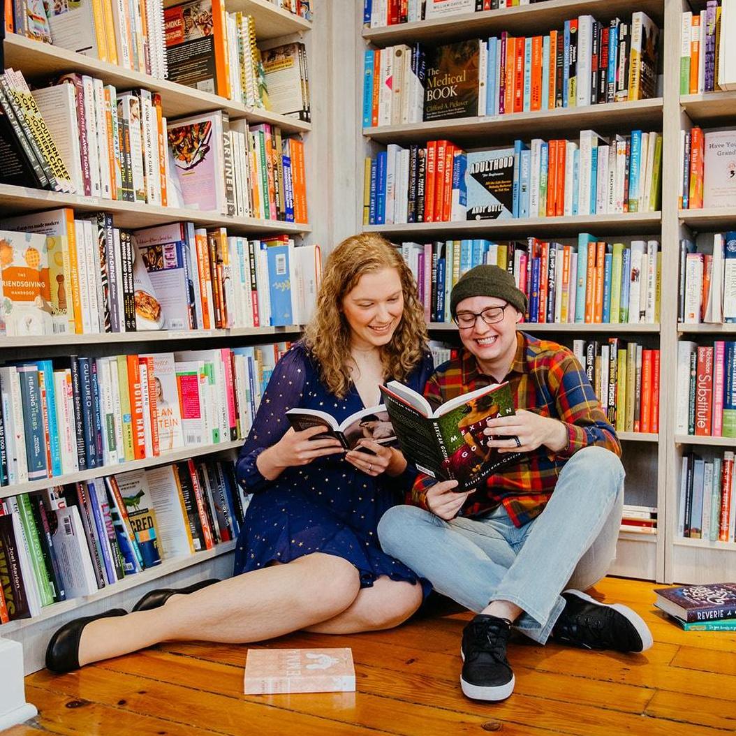 From our engagement session at Harvey's Tales in Geneva, our favorite bookstore!