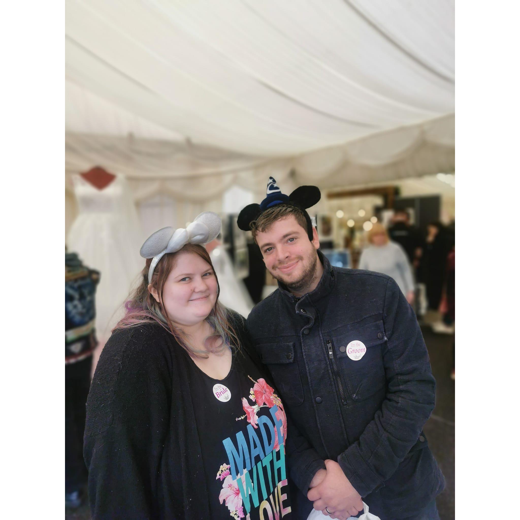 With Mickey and Minnie ears at one of many wedding fayres we attended while planning our day!