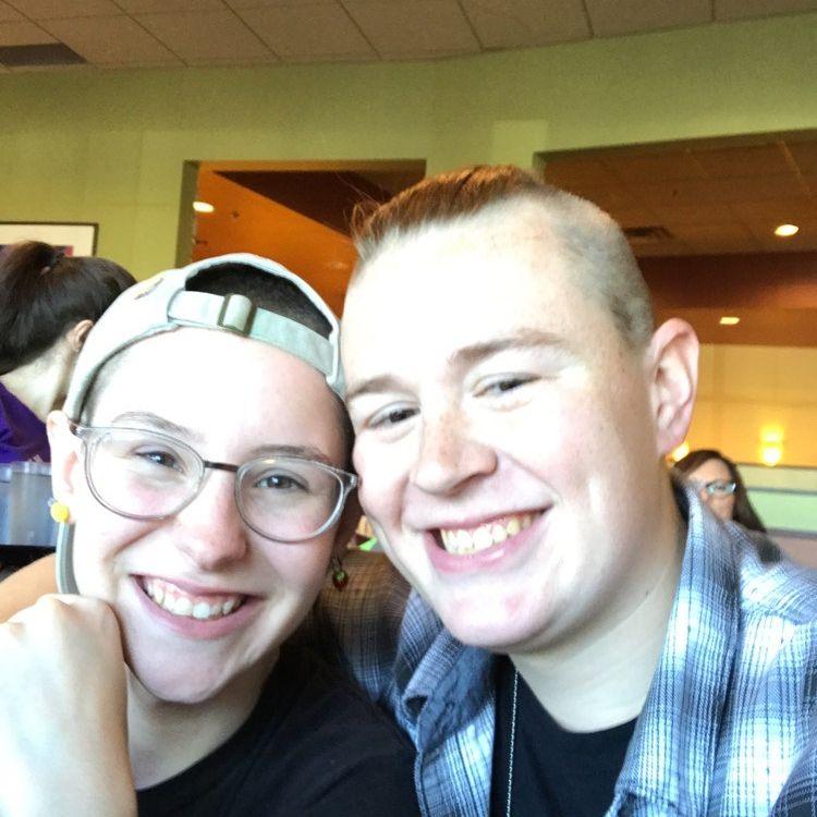 A picture from at least six years ago, before my baseball hat started falling apart and Sam still had her sides shaved. We look so young- although we don't look much different now!