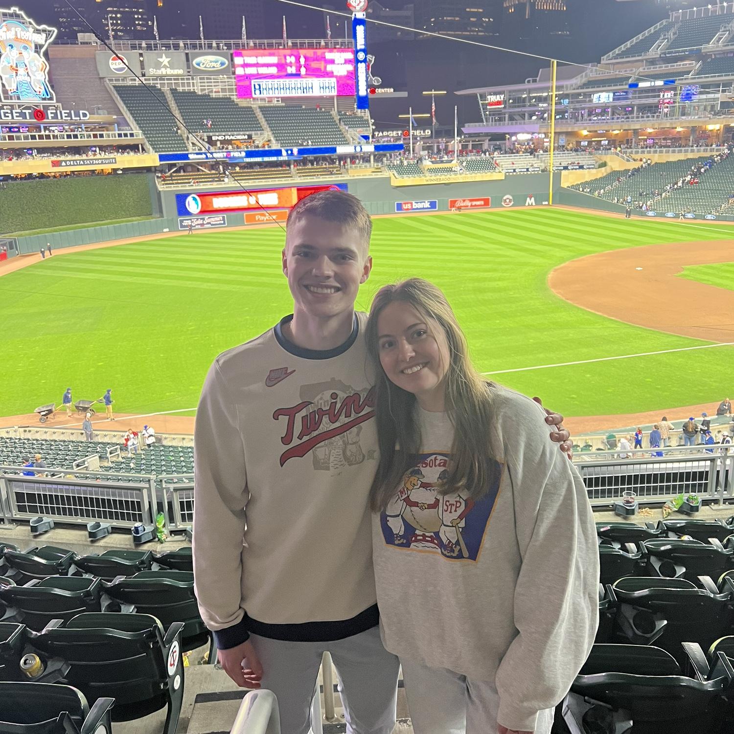 Our first photo together & the day we started dating. Nathan asked me to be his girlfriend in the middle of the Twins game