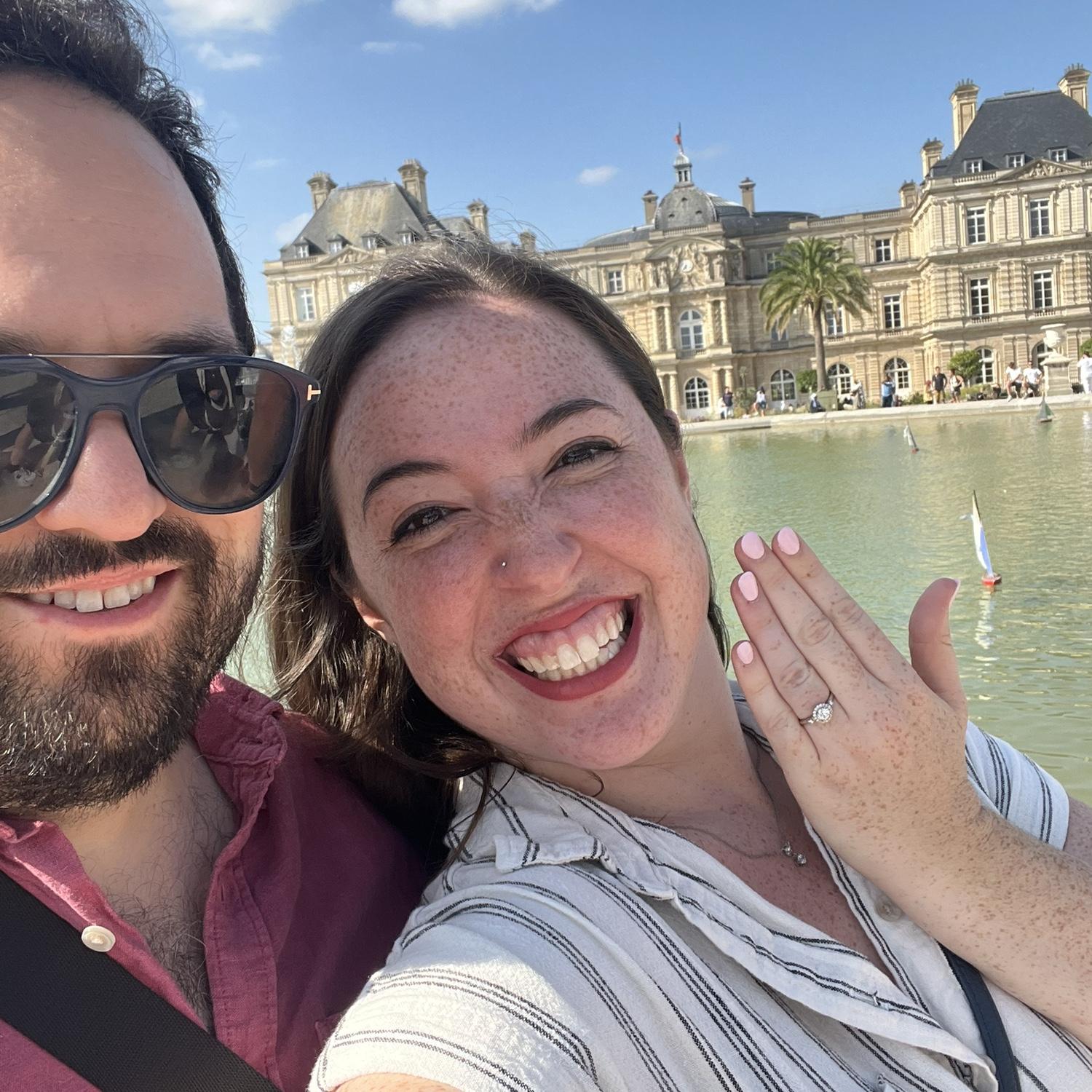Over-the-moon excited in Luxembourg Gardens following the engagement