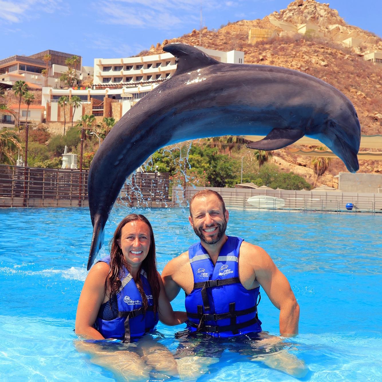 Tyler surprised Kelsey with a bucket list birthday gift, swimming with the dolphins!