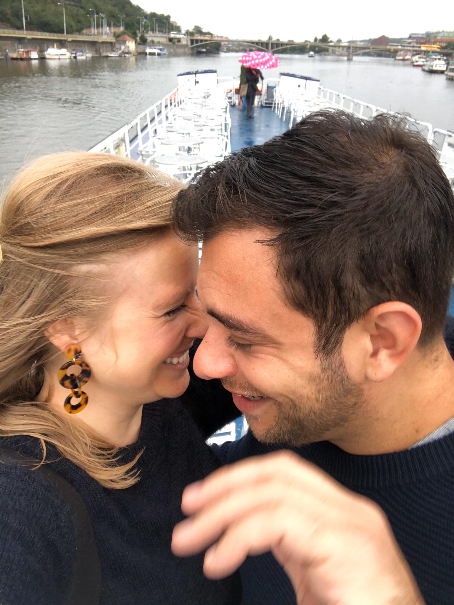 Braving the rain above deck. Prague. 2019.