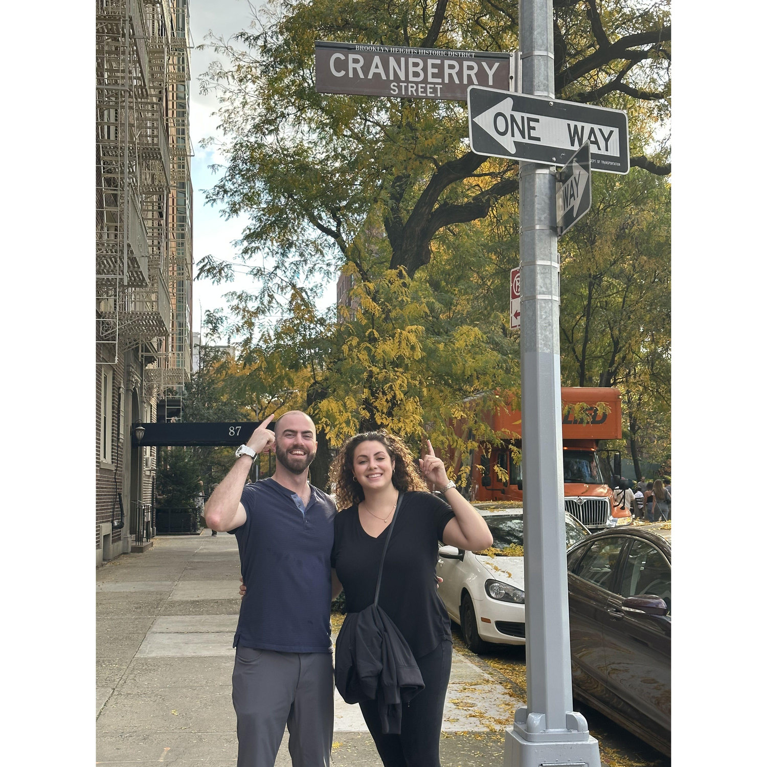 Standing under the sign for Cranberry St. in NY, which is both a street that Kevin's parents lived on and also a street where they filmed one of our favorite movies Moonstruck!