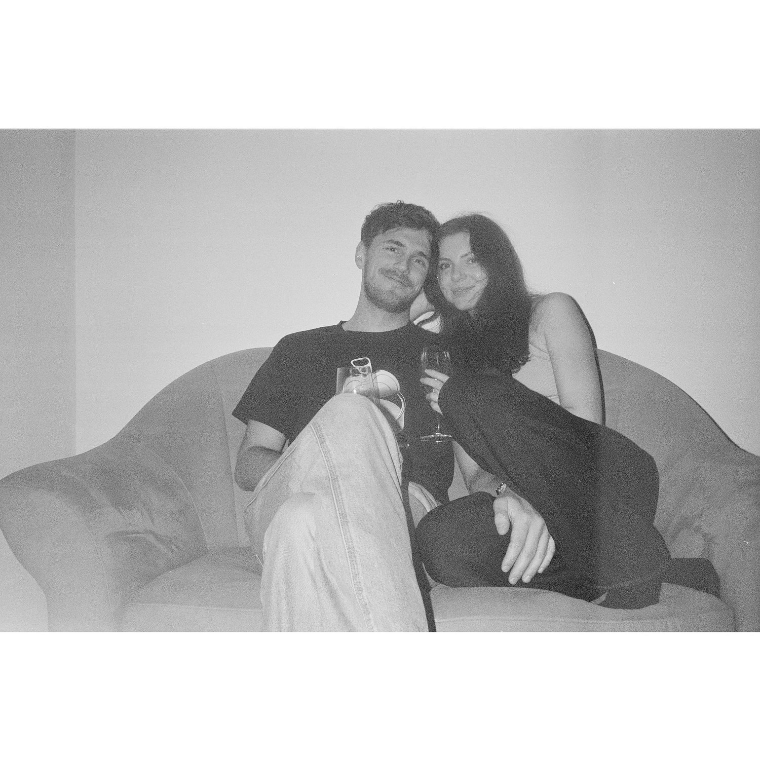 Sitting in our new fancy sofa...which we have now sold