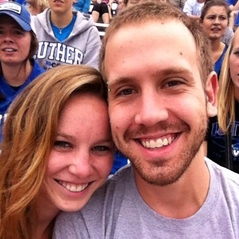 Enjoying each other's company far more than the Luther football game.